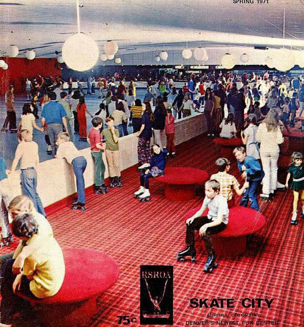 Vintage advertisement for Skate City Aurora featuring a crowded indoor skating rink.